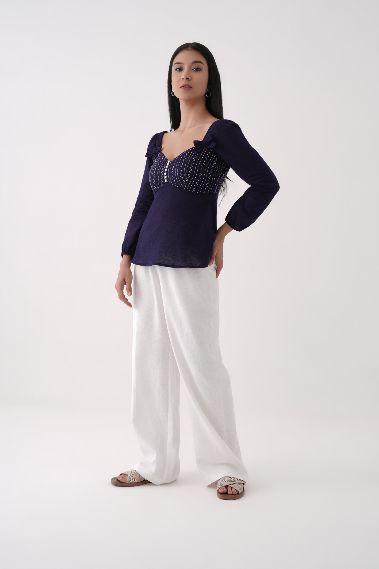 dark blue embroidered sweetheart peplum  top